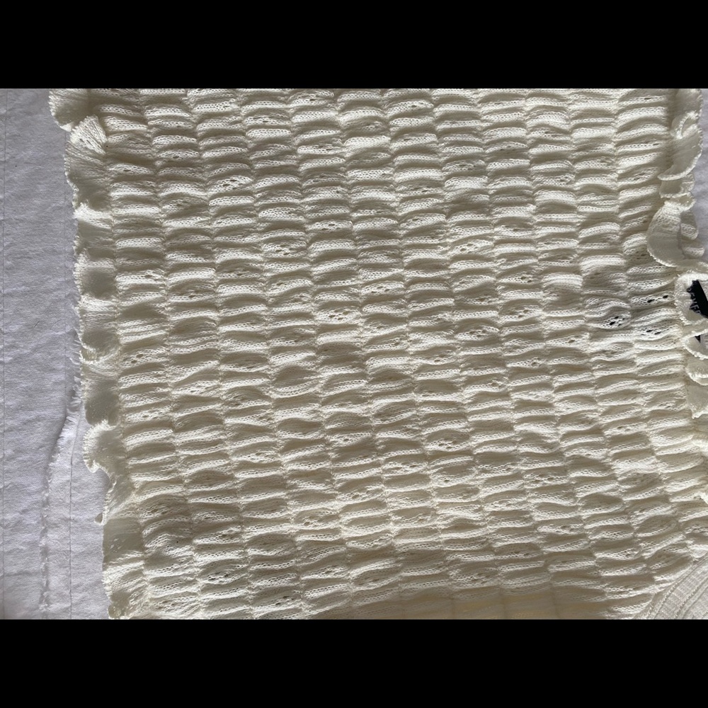 This is a white ruffled and detailed crop top - Picture 4 of 7